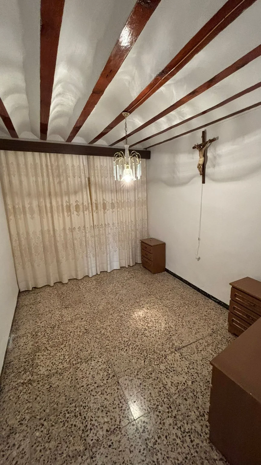 Dormitorio antes de la transformación